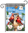 Decorative garden flag with cardinals, birdhouse, and 'Bless this Home' text on a blue background.