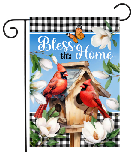 Decorative garden flag with cardinals, birdhouse, and 'Bless this Home' text on a blue background.