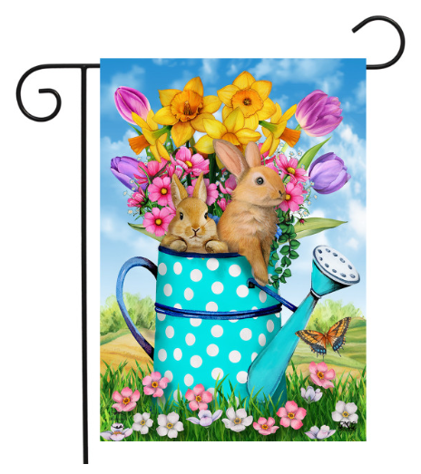 Decorative garden flag with bunnies in a polka dot watering can surrounded by flowers and butterflies.