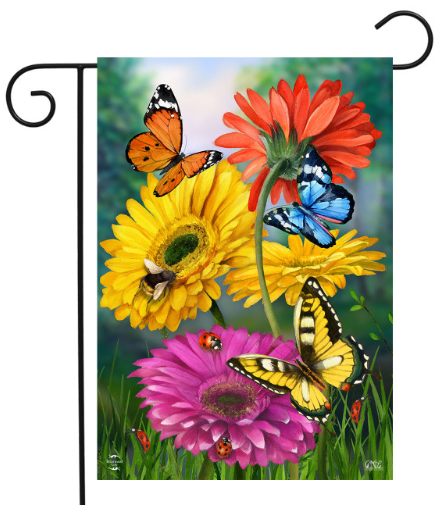 Decorative garden flag with colorful flowers and butterflies on a green background.
