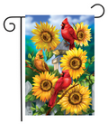 Decorative garden flag with cardinals and sunflowers on a blue sky background.