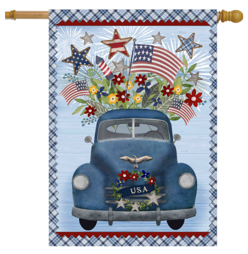 Decorative flag with a blue truck, American flags, and flowers on a checkered border.
