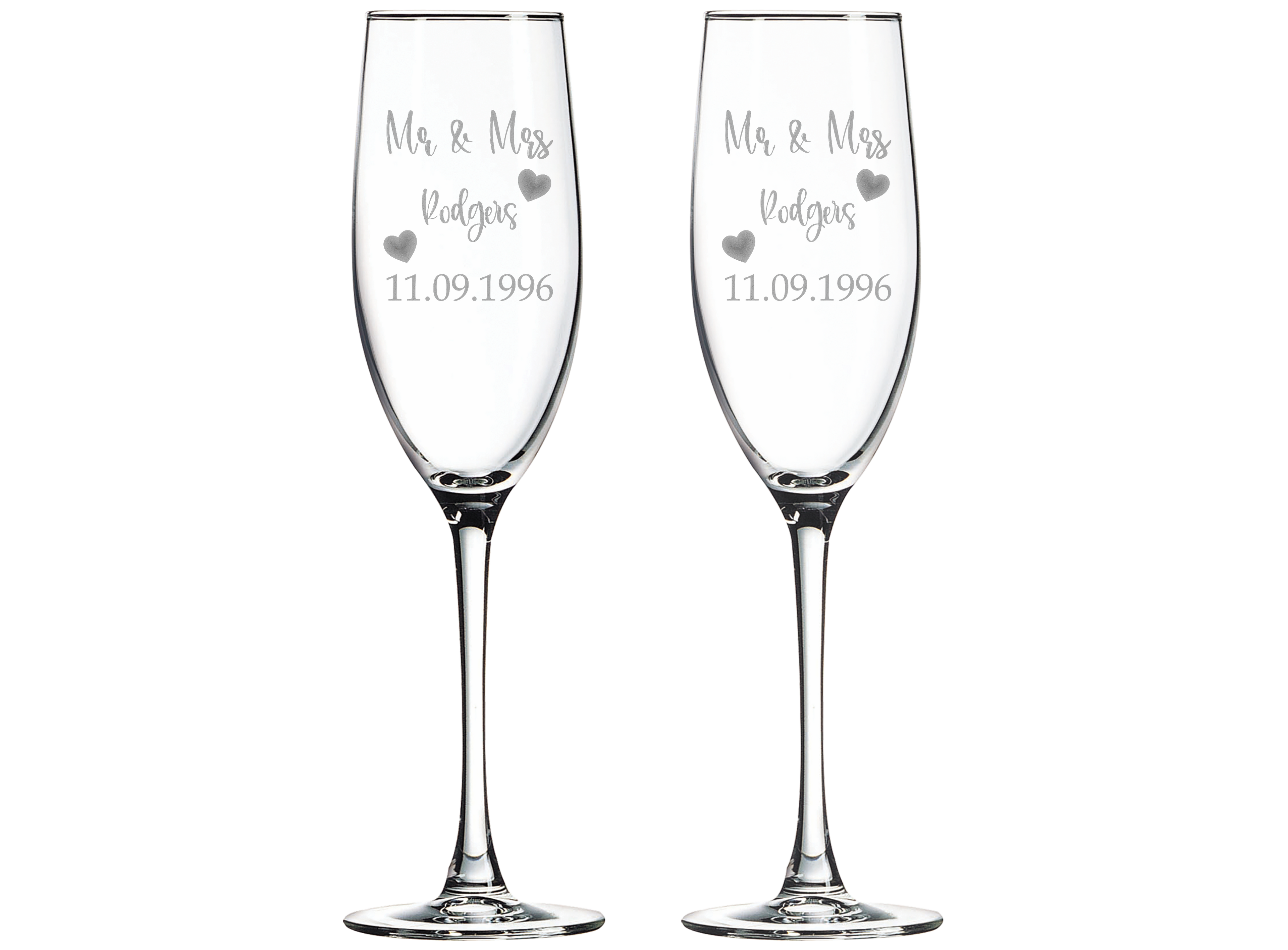 Two champagne flutes with laser engraved 'Mr & Mrs' and personalized text on a white background