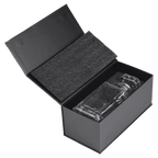 Clear glass object in an open black box with black interior