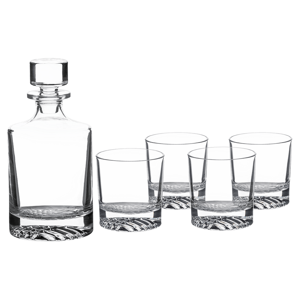 Clear glass decanter and four glasses on a white background