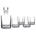 Clear glass decanter and four glasses on a white background