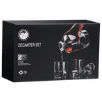 Polar Decanter Set packaging with a hand pouring liquid into a decanter.