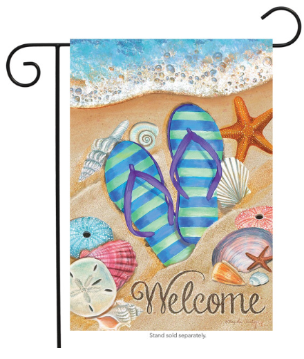 Decorative flag with flip-flops, shells, and 'Welcome' text on a beach theme.