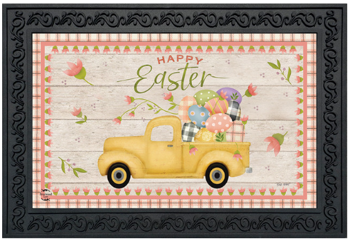 Decorative mat with a yellow truck carrying Easter eggs and flowers on a checkered background.