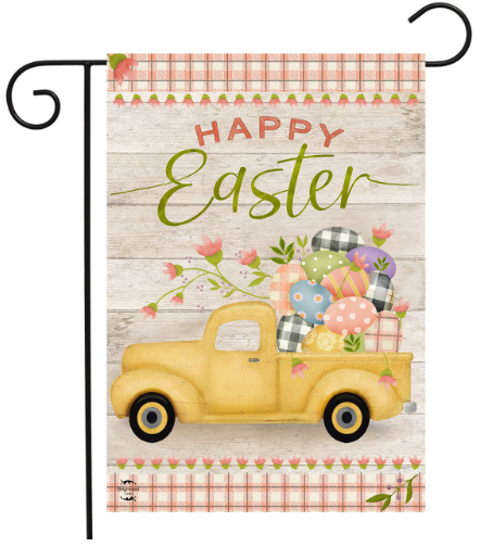 Garden flag with a yellow truck, Easter eggs, and flowers on a wooden background with 'Happy Easter' text.