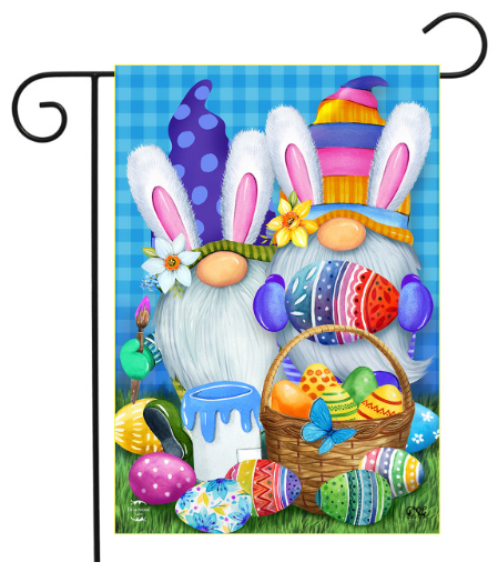 Decorative garden flag with an Easter gnome holding a basket of eggs on a blue checkered background.