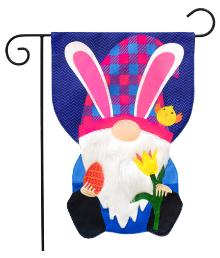 Gnome with bunny ears and a chick on a blue and pink checkered background