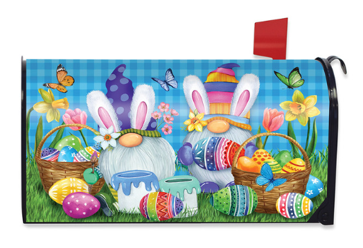 Easter-themed mailbox cover with colorful gnomes, eggs, and flowers on a blue background.