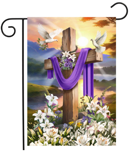 Decorative flag with a cross, flowers, and doves against a scenic background