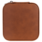 A square brown faux-leather zippered case with rounded corners, shown from a top-down view on a solid green background.
