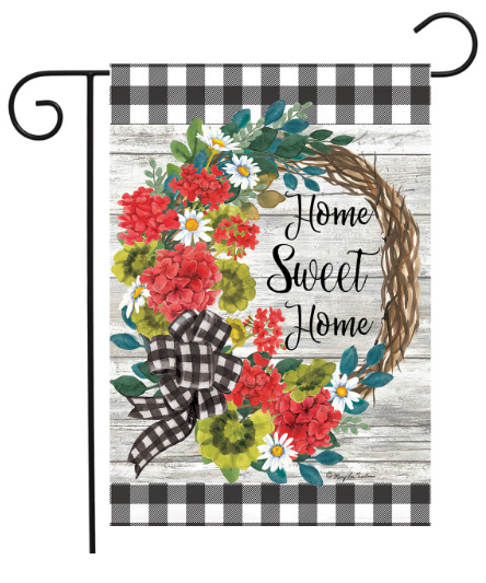 Decorative garden flag with floral design and 'Home Sweet Home' text on a checkered background.