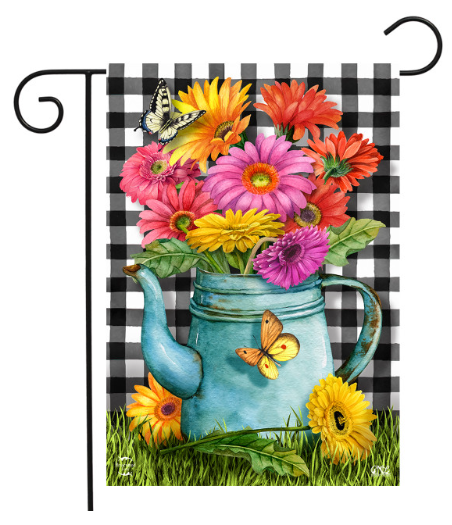 Decorative garden flag with a blue watering can filled with colorful flowers and butterflies on a checkered background.
