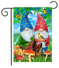 Decorative garden flag with two gnomes, mushrooms, and butterflies on a colorful background.