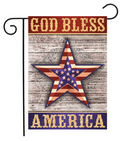 Decorative flag with 'God Bless America' text and a star design on a wooden background.