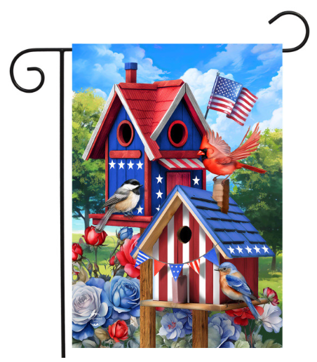 Decorative garden flag with birdhouses, birds, and American flags on a blue sky background.