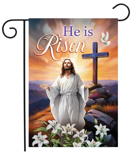 Decorative flag with Jesus Christ, cross, and 'He is Risen' text against a sunset background.