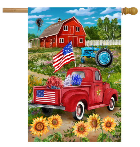 Decorative flag with a red truck, American flag, and barn in a rural setting.