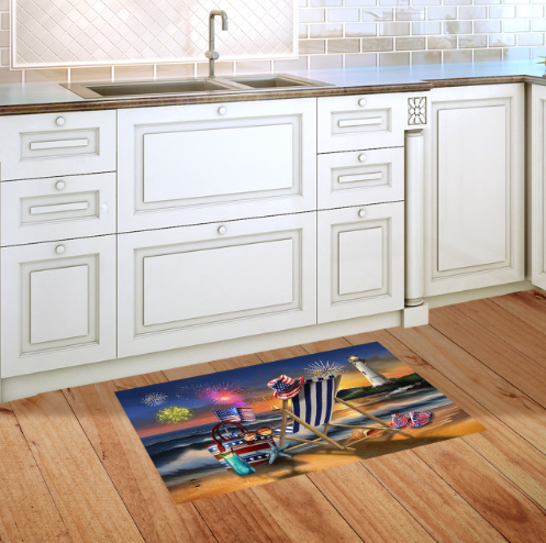 Kitchen with a decorative rug featuring a beach scene on the wooden floor.