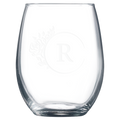 Clear glass tumbler with laser engraved design on a white background