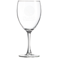 Clear wine glass with laser engraved design on a white background