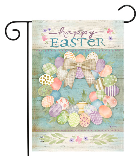 Decorative garden flag with Easter design featuring eggs and bows on a wooden background.