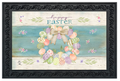 Decorative mat with Easter design featuring eggs and a bow on a wooden background.