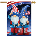 Decorative flag with two gnomes wearing American-themed outfits against a star-spangled background.