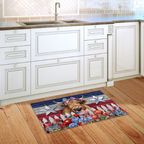 Decorative doormat with a cow design on a wooden floor in a kitchen.