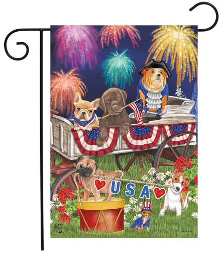 Decorative garden flag with dogs in a wagon and fireworks in the background