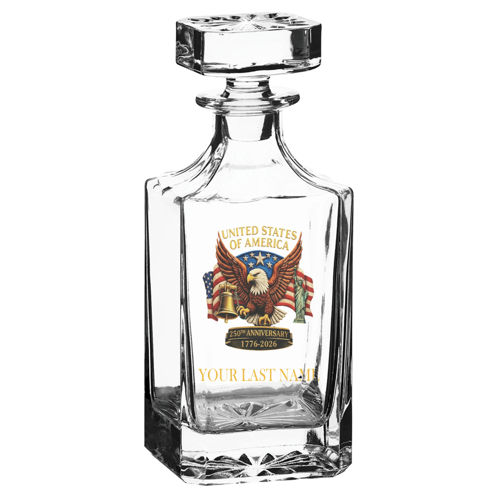 Clear glass decanter with American eagle and flag design on a white background