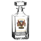 Clear glass decanter with American eagle and flag design on a white background
