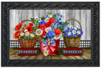 Decorative mat with floral arrangements in baskets on a wooden floor.
