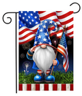 Gnome holding an American flag with fireworks and USA flag in the background