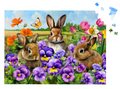 Three rabbits among flowers and butterflies in a garden setting