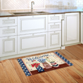Decorative doormat with 'Welcome' text on a wooden floor in a kitchen.