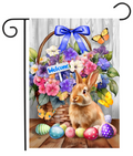 Decorative flag with a rabbit, flowers, and Easter eggs on a wooden surface.