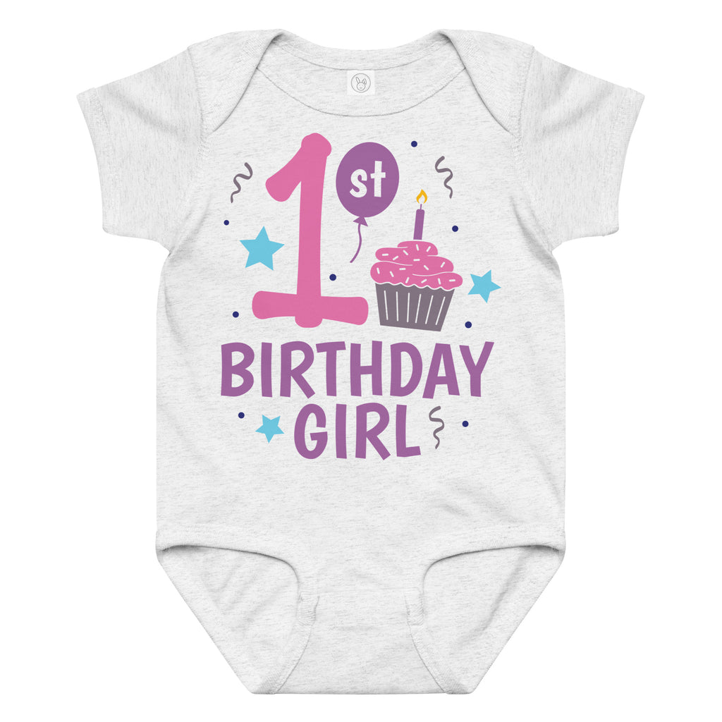 White baby onesie with '1st Birthday Girl' text and birthday-themed graphics on a white background