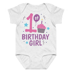 White baby onesie with '1st Birthday Girl' text and birthday-themed graphics on a white background