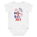 White baby onesie with 'My 1st 4th of July' text and fireworks design on a white background