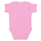 Pink baby onesie on a white background