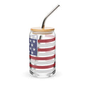 Clear glass jar with American flag design, wooden lid, and metal straw on a white background