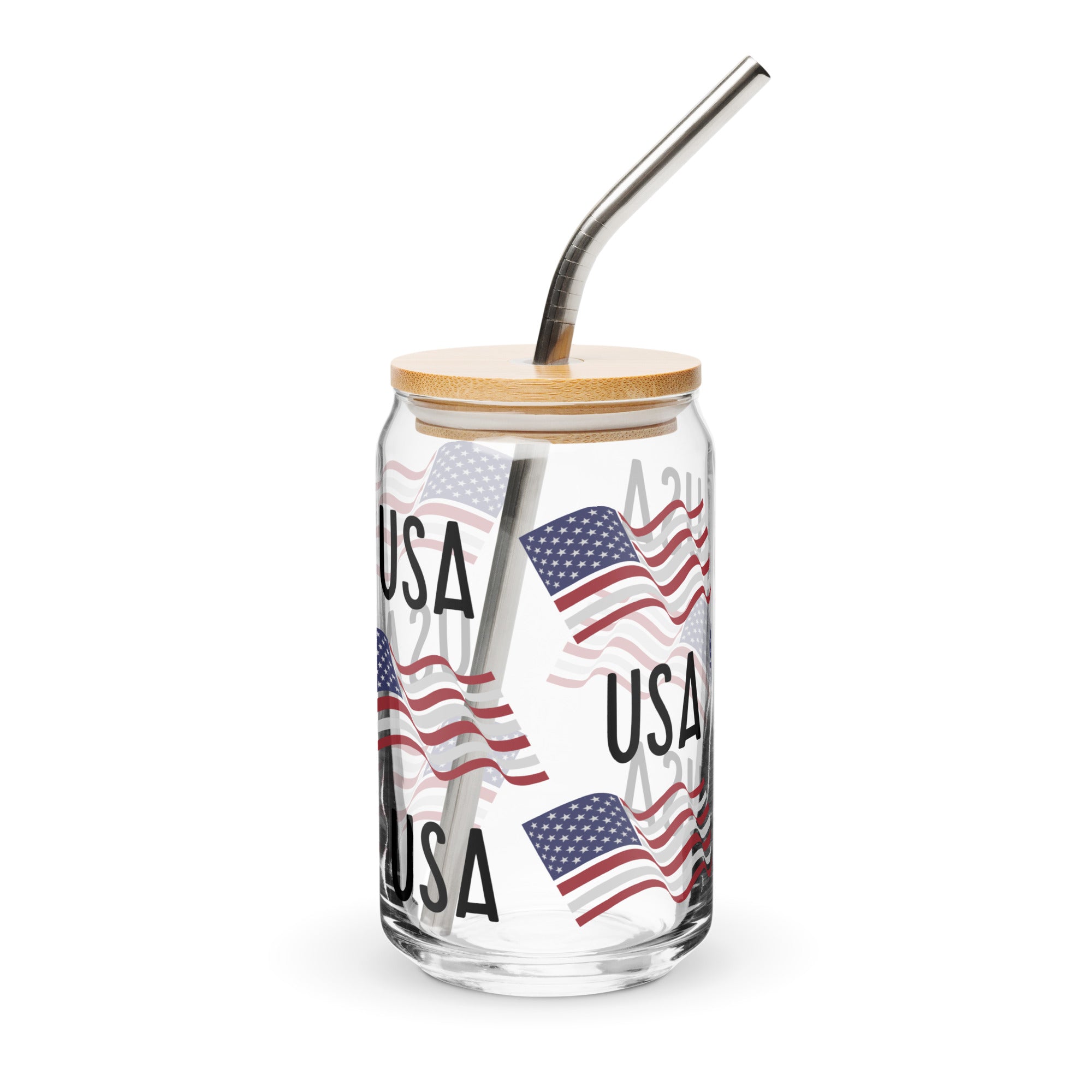 Glass tumbler with USA text and American flags design, bamboo lid, and metal straw on a white background.