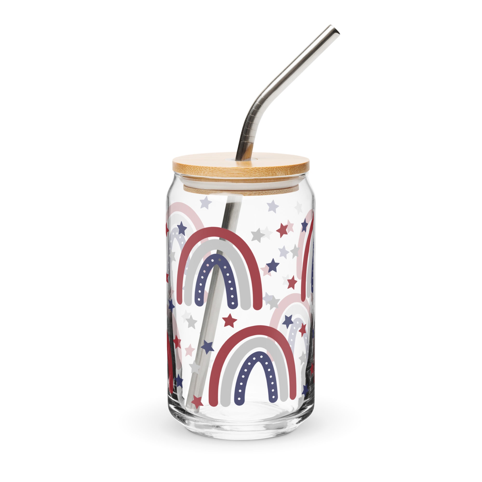 Glass tumbler with rainbow design, wooden lid, and metal straw on a white background