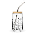 Glass tumbler with bamboo lid and metal straw featuring black floral and butterfly design on a white background