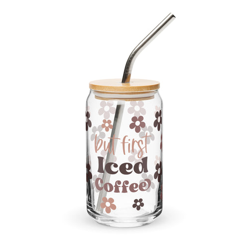Glass tumbler with floral design and 'but first Iced Coffee' text on a white background